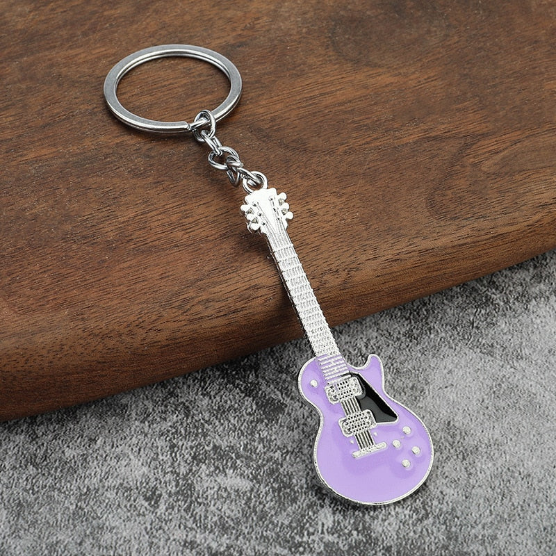 Creative Musical Instrument Pendant Event Gift Bag Pendant Metal Lacquer Guitar Keychain PURPLE